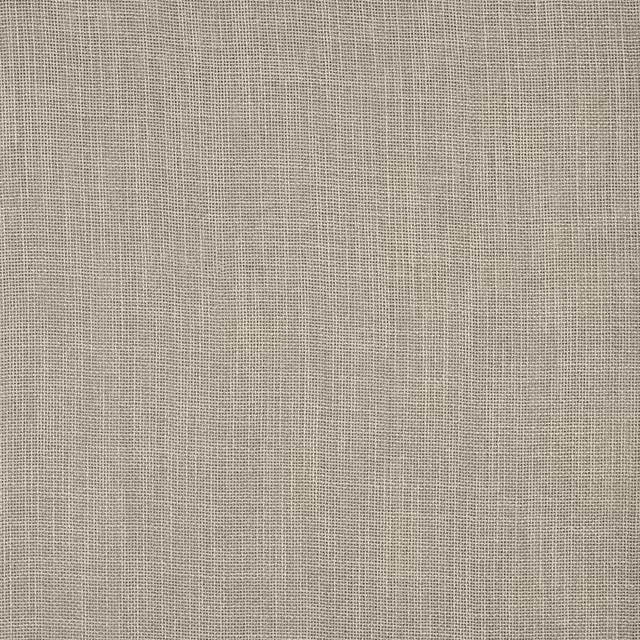 Close-up of a warm beige plain weave fabric with a fine linen-like texture