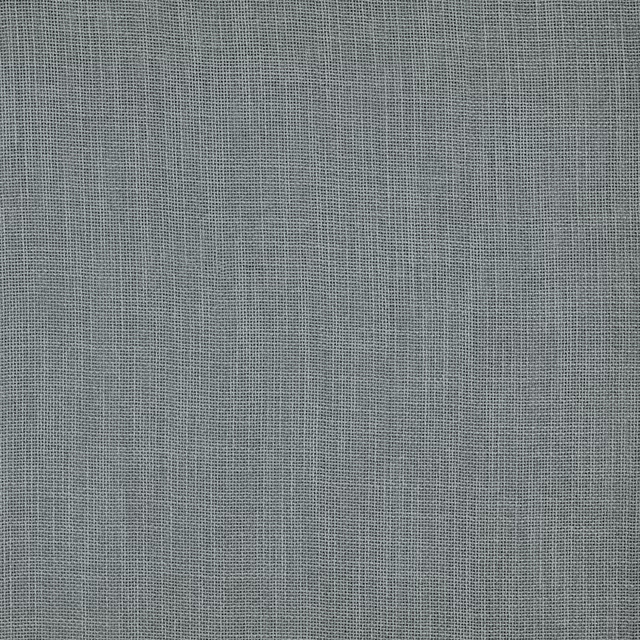 Close-up of a plain woven spa teal fabric with a fine, even texture