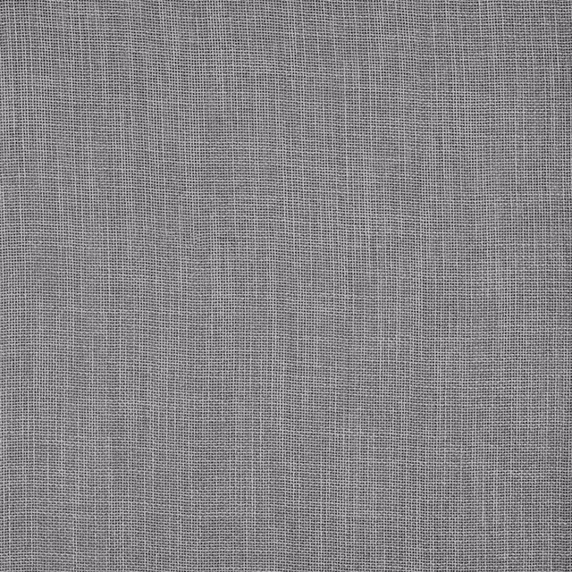 Close-up of a plain woven steel grey fabric with a fine texture