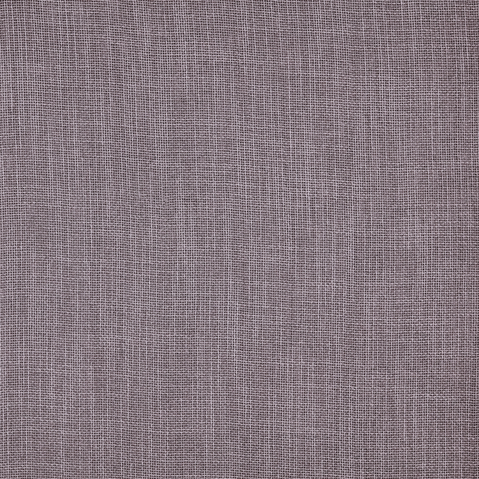 Close-up of a soft wisteria lilac plain weave fabric with fine texture