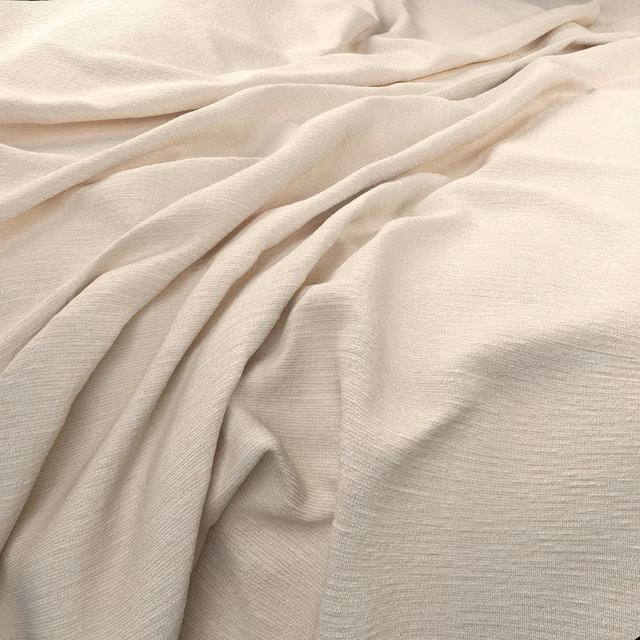 Draped Cambridge Chalk fabric showing a fine ivory horizontal weave and soft gathered folds