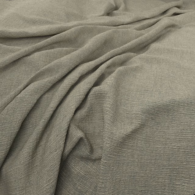 Soft greige Cambridge fabric showing fine ribbed weave in fluid draped folds