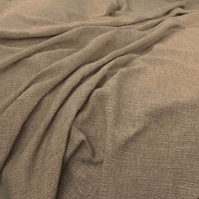 Muted mushroom-taupe fabric with fine horizontal weave gathered into soft folds