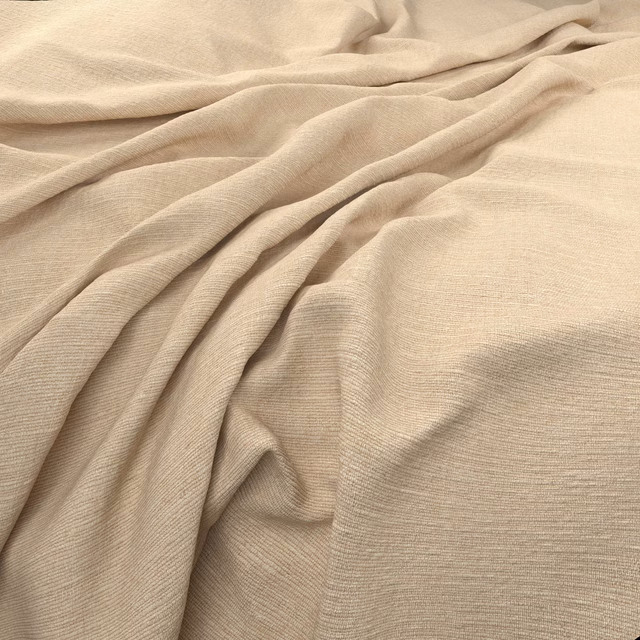 Warm ivory fabric with fine horizontal ribbing gathered into soft folds