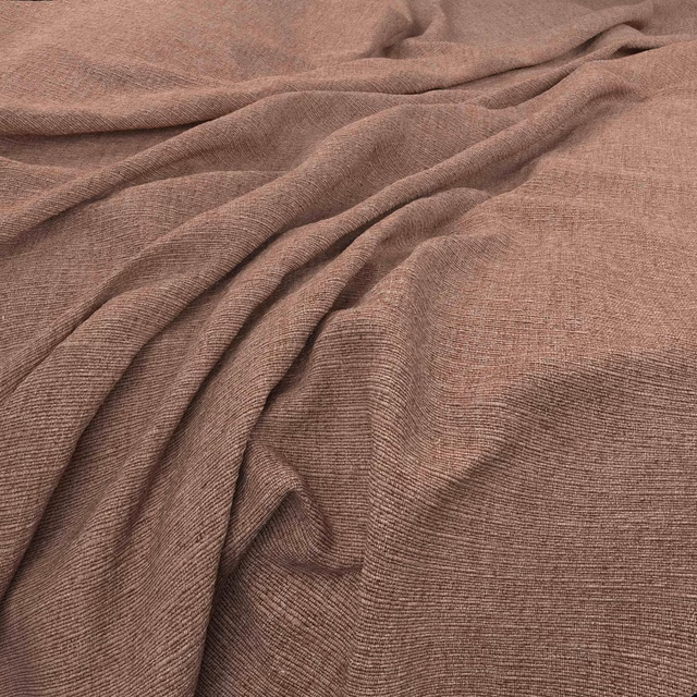 Warm dusty rose-taupe fabric with fine horizontal texture falling in soft folds