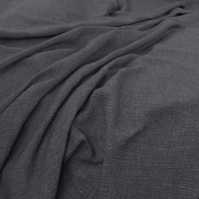Dark charcoal-grey woven fabric with fine ribbing, softly gathered in folds