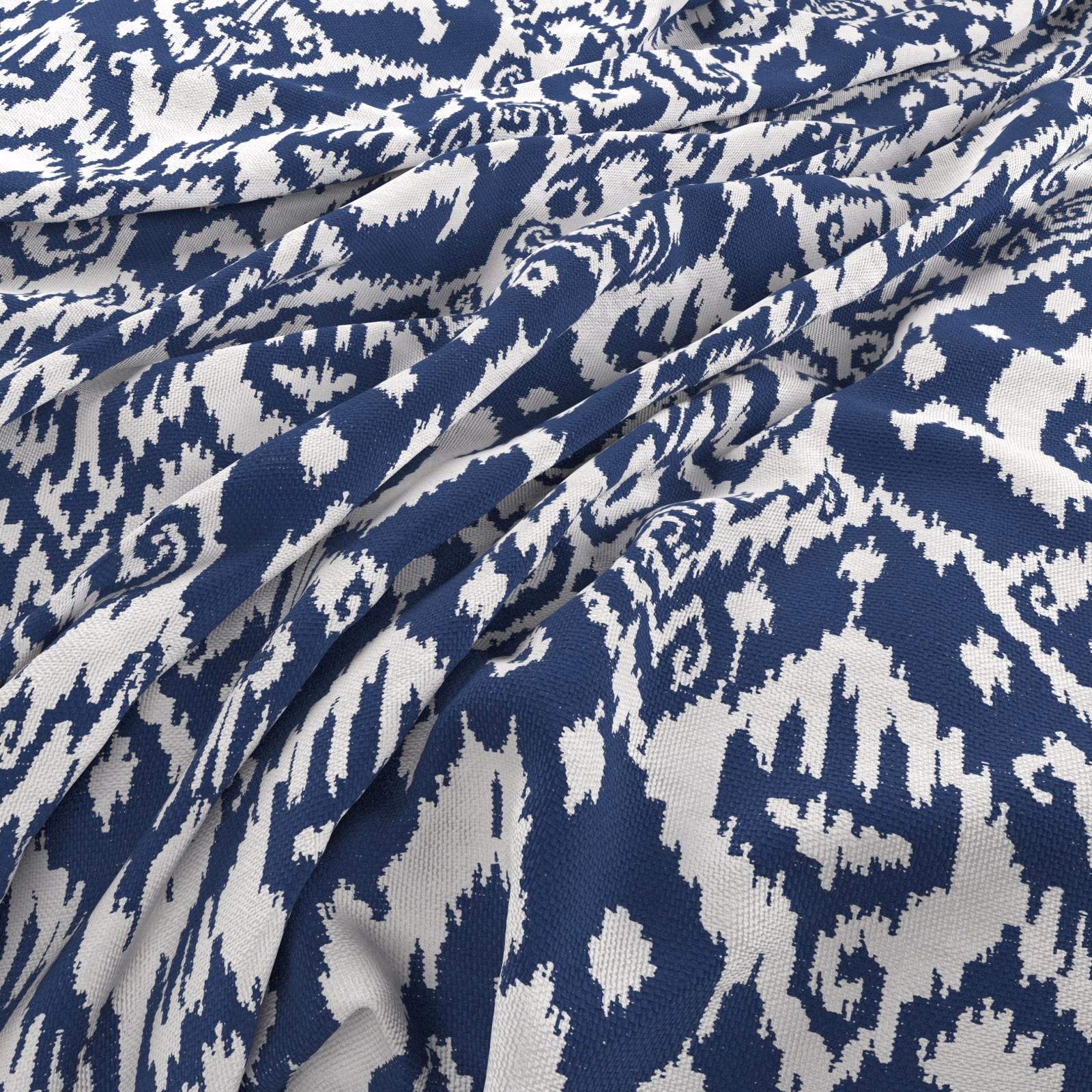 Deep azure and white folded fabric showing an irregular scrolling woven motif