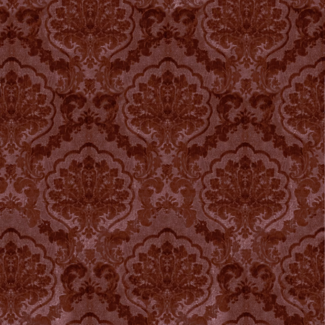Burgundy damask fabric with softly raised tonal ornament and warm red depth