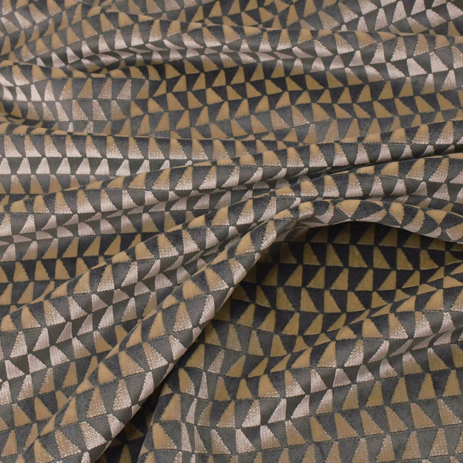 Titanium woven fabric with charcoal, taupe and silver triangular geometric pattern