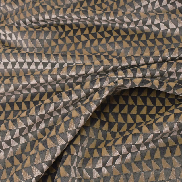 Titanium woven fabric with charcoal, taupe and silver triangular geometric pattern