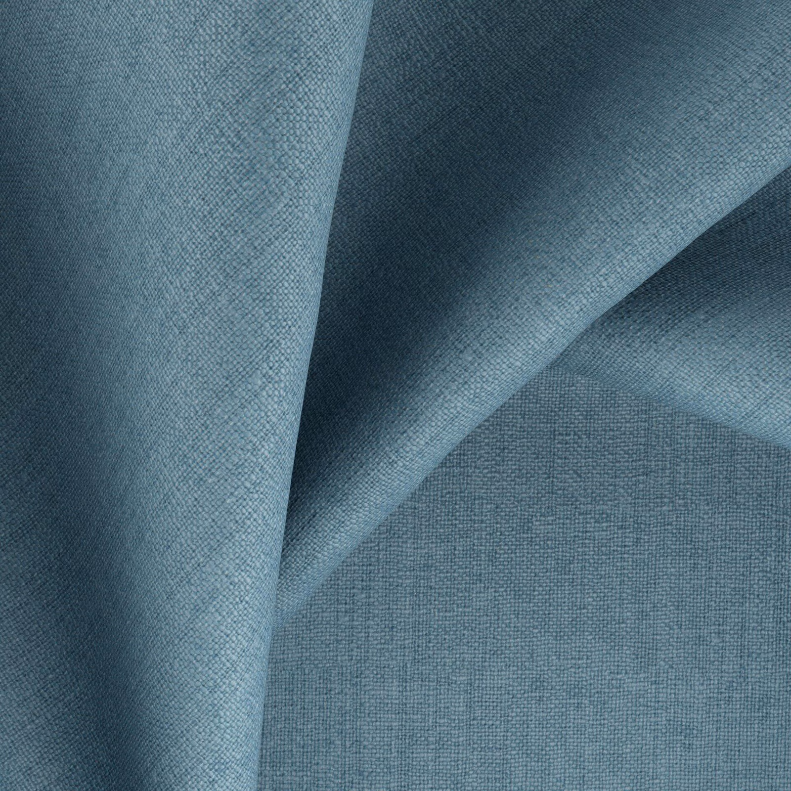 Cool airforce blue-grey fabric with a fine woven texture and folded shadows