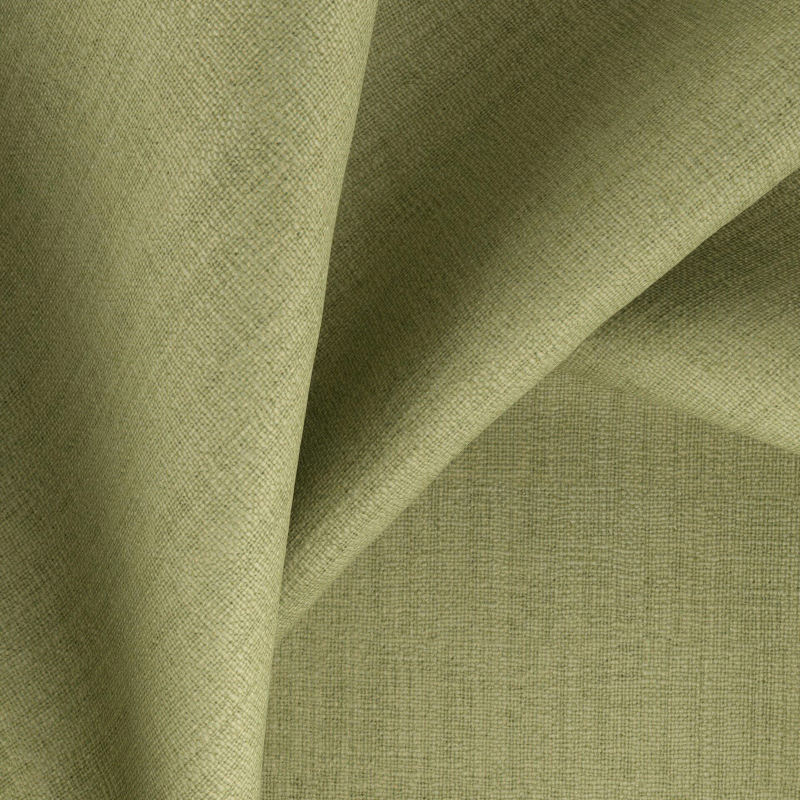 Muted apple-green woven fabric with fine crosshatched texture and softly shaded folds