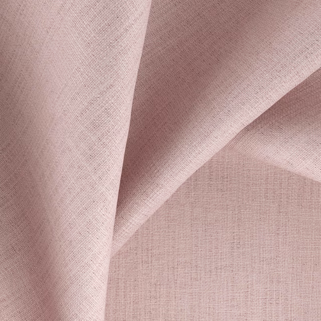 Muted blush-pink woven swatch folded to show its fine crosshatch texture