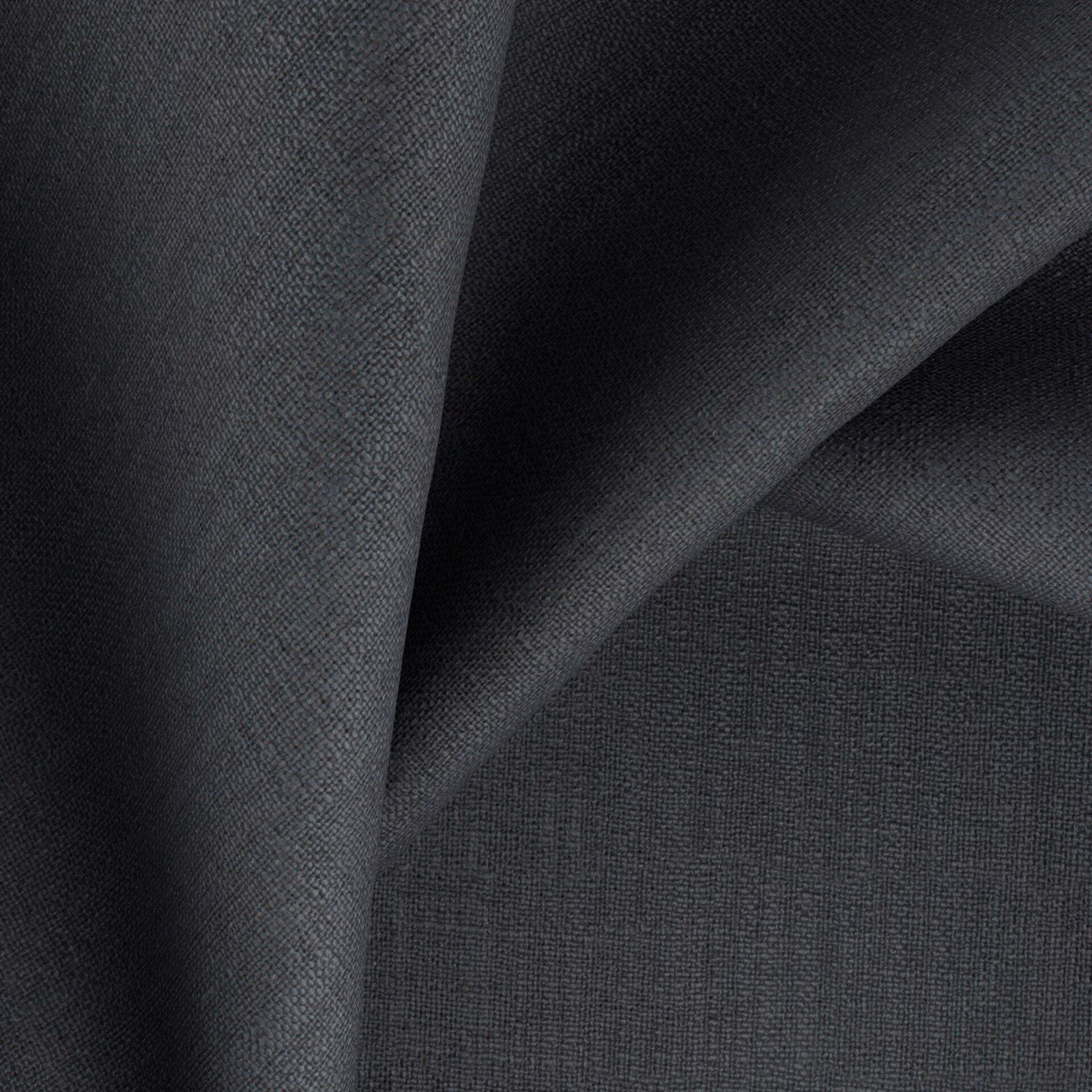 Deep charcoal woven fabric swatch with fine texture and shadowed folded surface