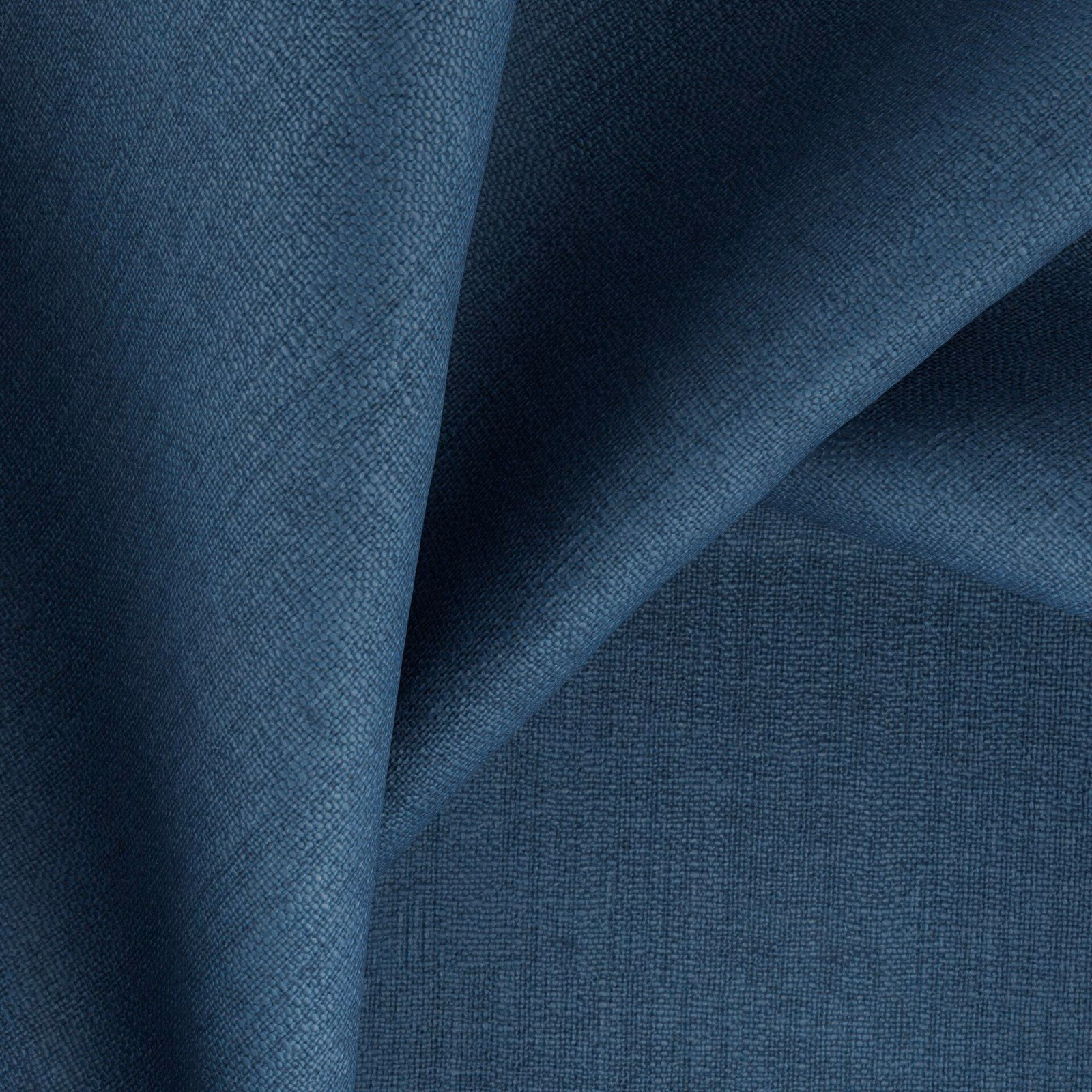Deep cobalt blue fabric with fine crosshatched weave and sculptural folded texture