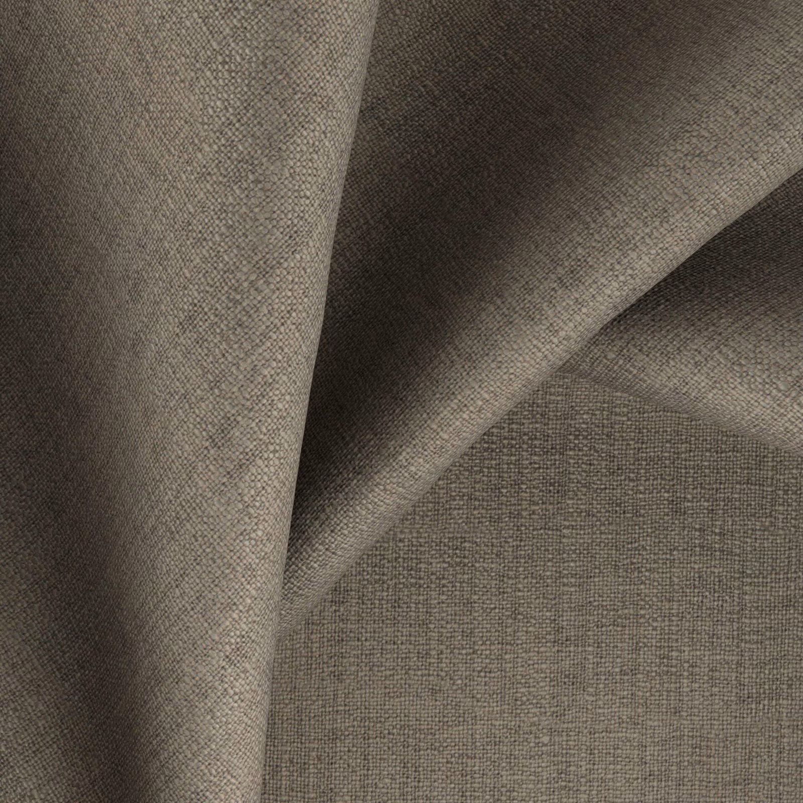 Folded muted coriander taupe fabric showing a fine, even woven texture