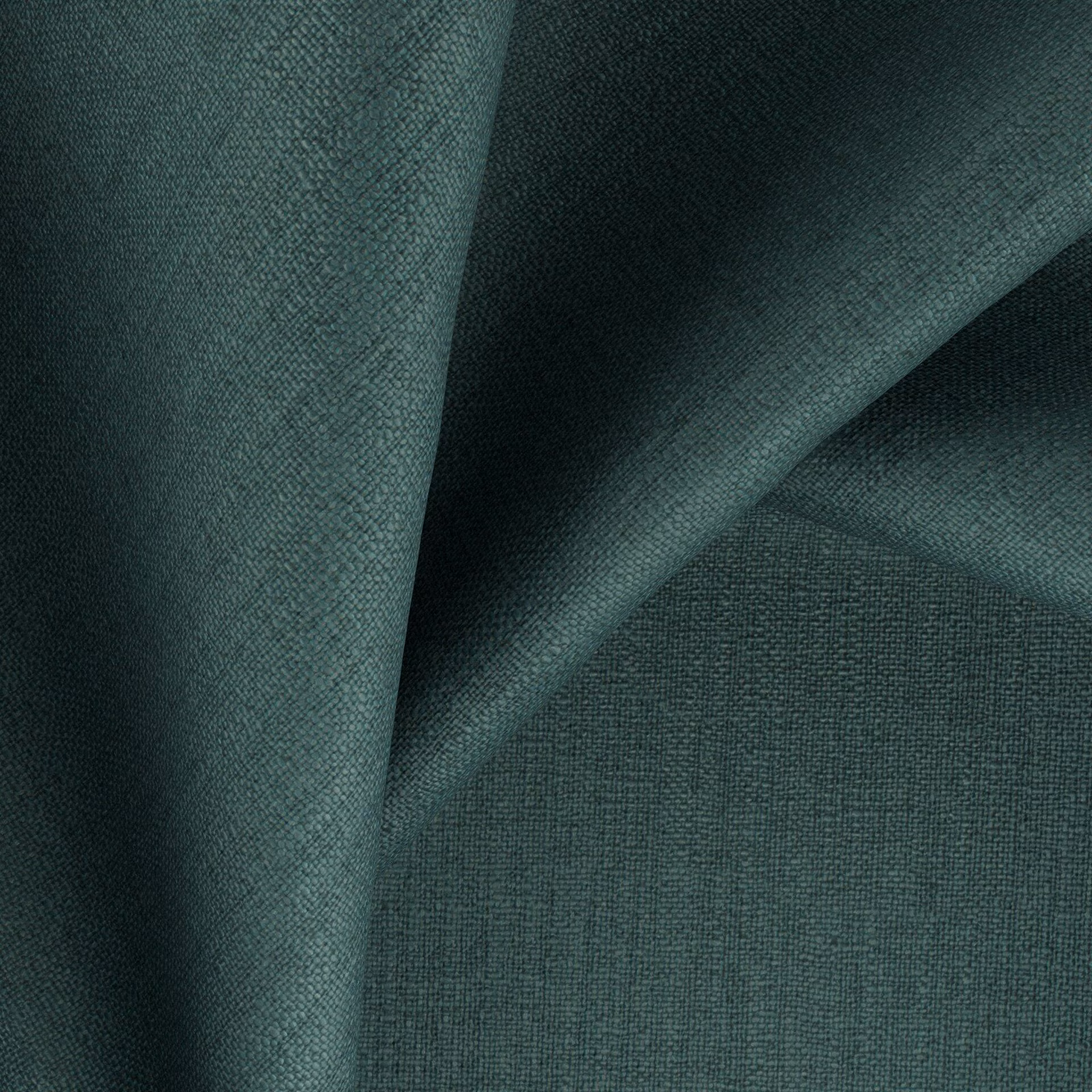 Deep emerald blue-green fabric with a fine woven texture in folded light