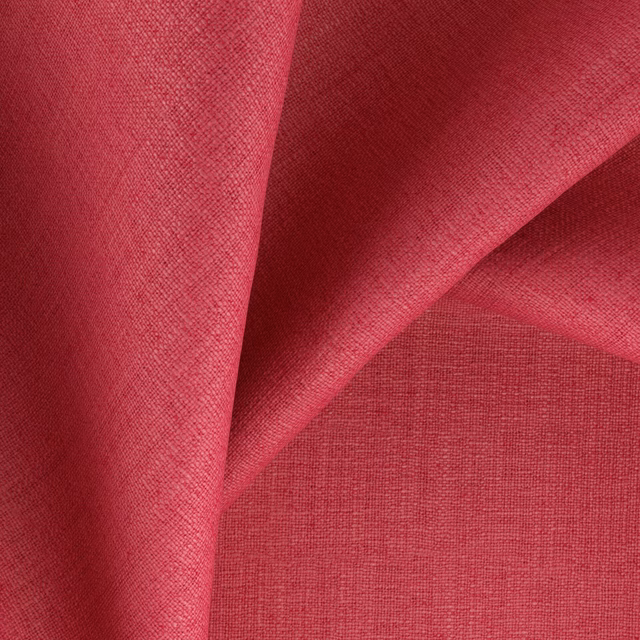 Saturated fuchsia woven fabric with fine crosshatch texture and deep folded shadows