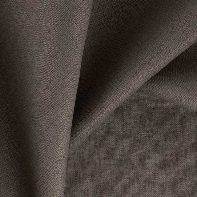 Dark khaki crosshatched upholstery fabric folded to show its softly textured weave