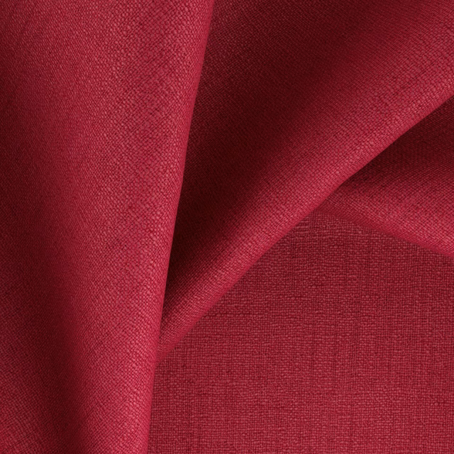 Deep raspberry-red woven fabric swatch with fine texture and softly folded tonal shadows