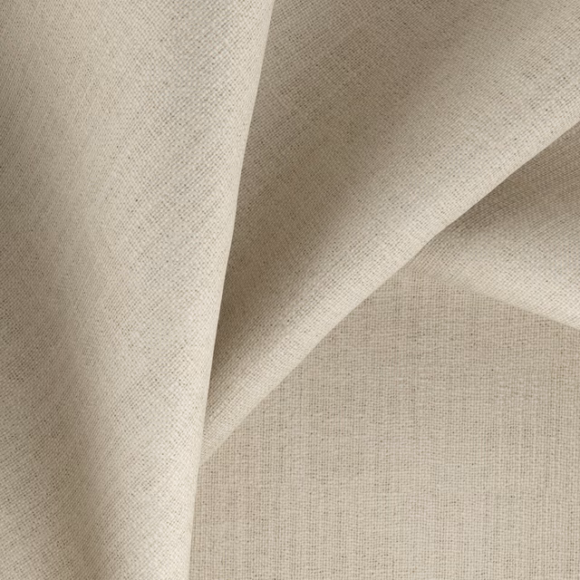 Warm beige finely woven textile folded to show its softly tactile surface
