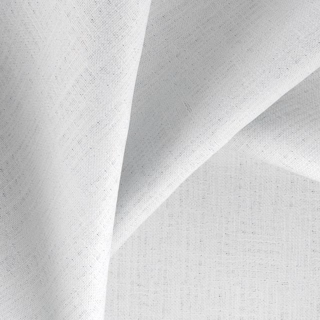 Icy pale grey fine-weave textile draped in angular, softly lit folds