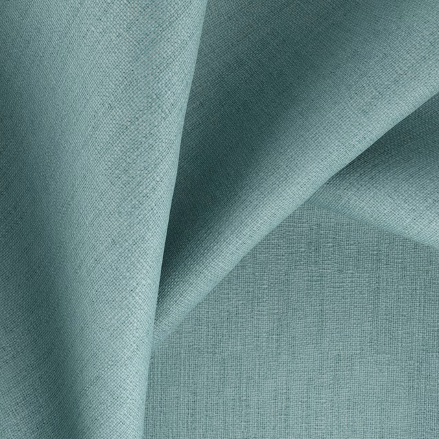 Cool spearmint teal woven fabric with fine crosshatch texture in folded swatch