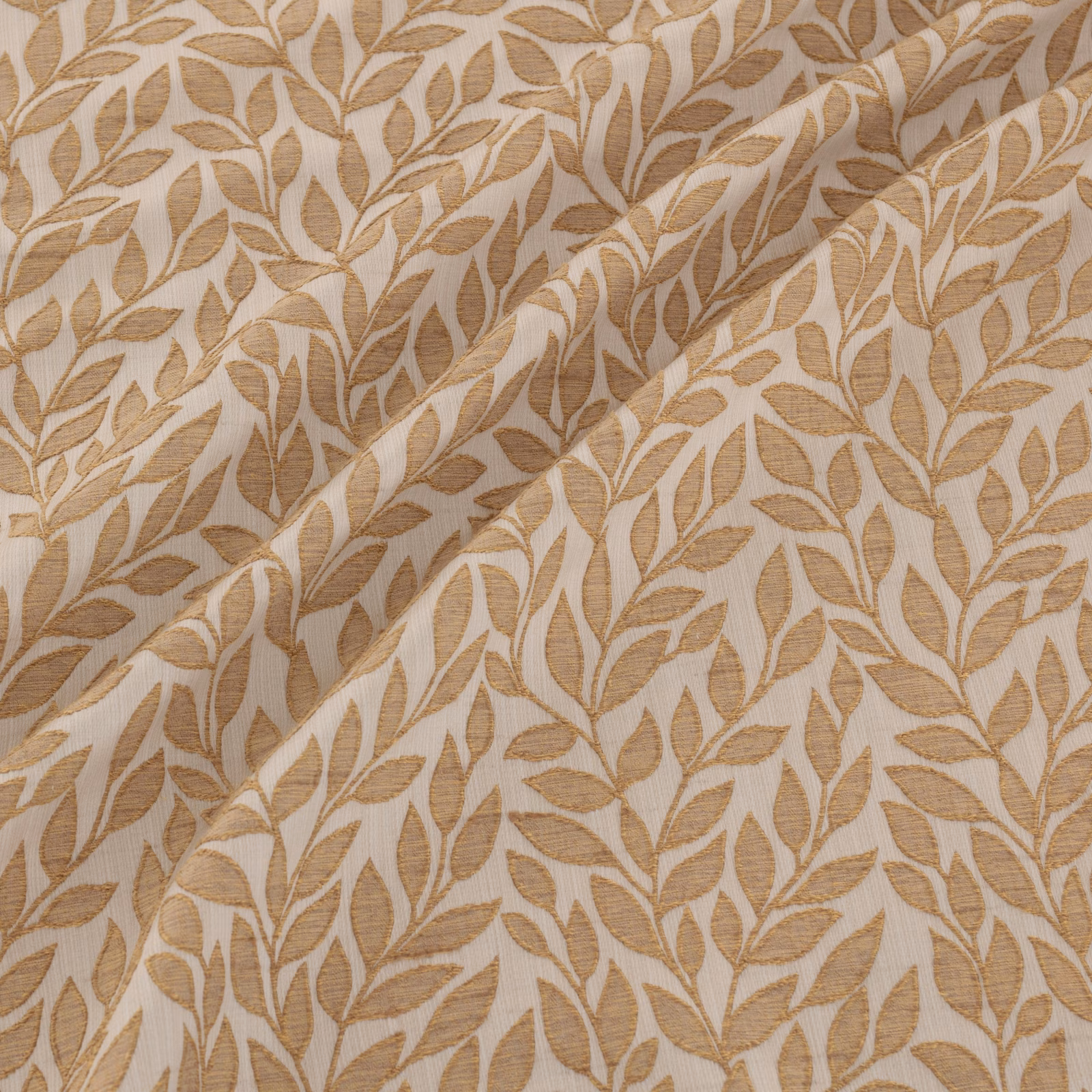 Warm copper-brown leaf vines woven across a pale beige textured fabric