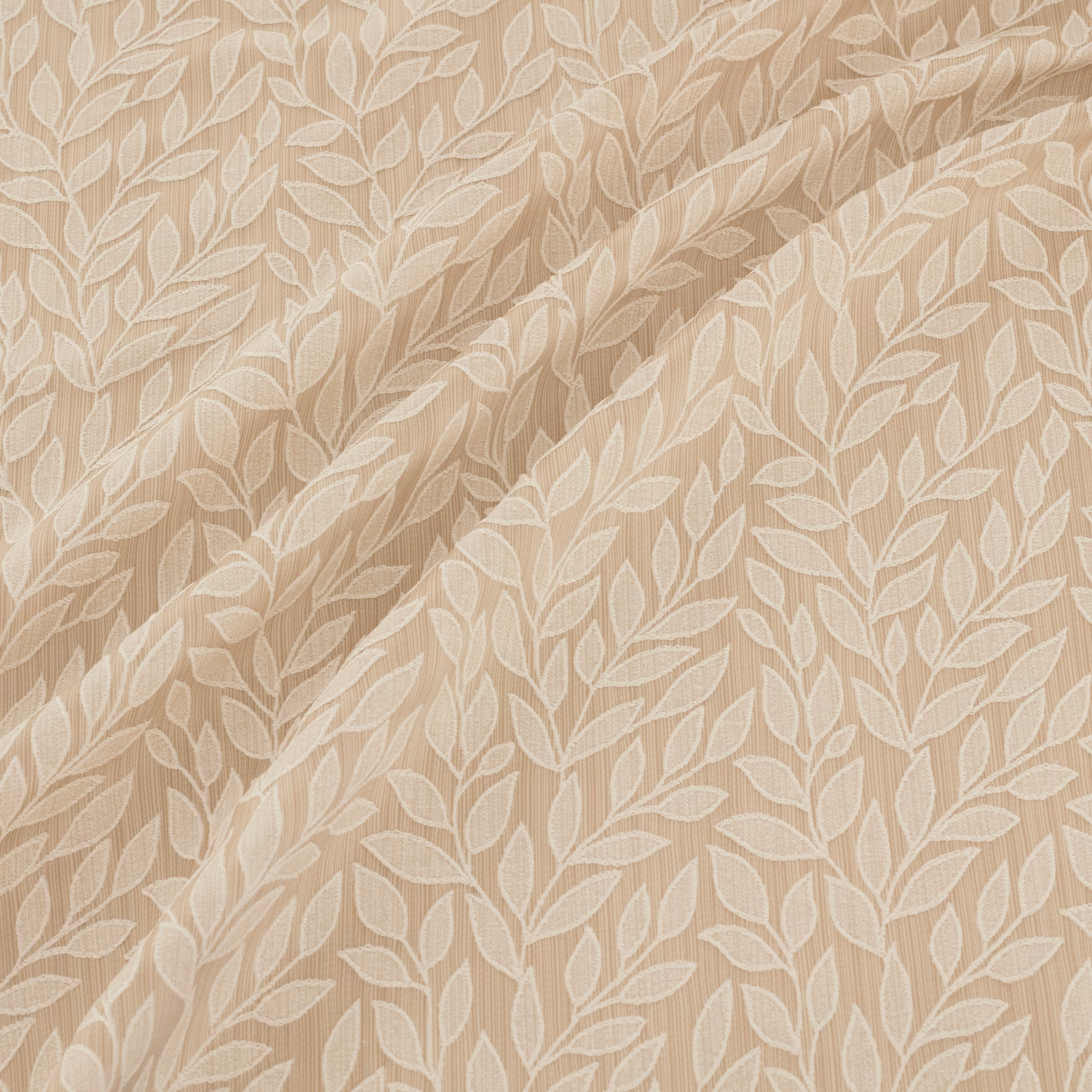 Warm beige woven fabric with ivory leafy vines and softly textured tonal detail