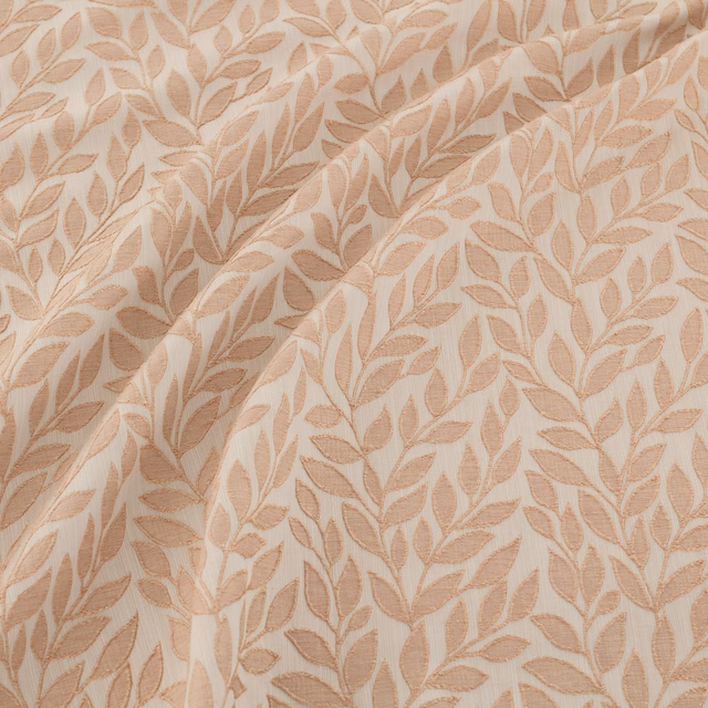 Warm cream fabric with dense blush rose-gold leaf trails and soft folds