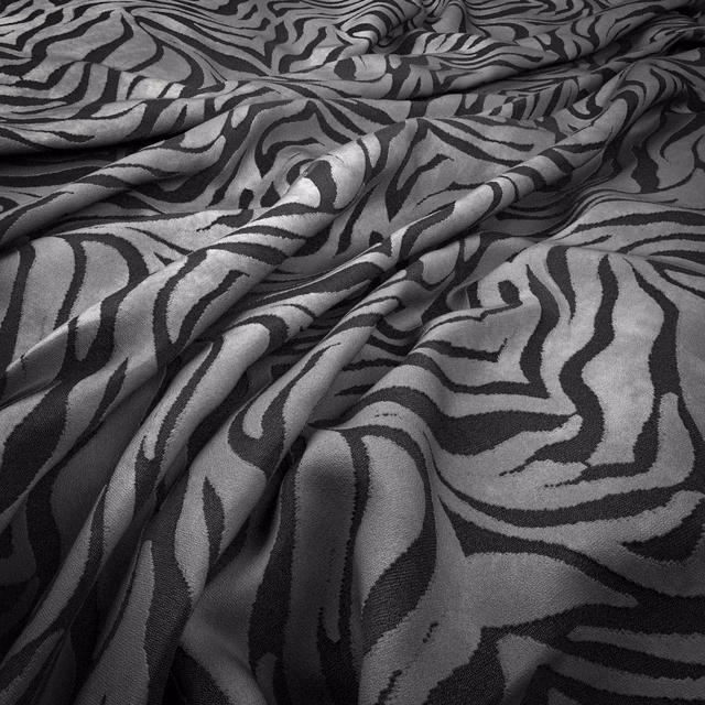 Cool zinc-grey fabric with black organic zebra stripes and soft surface sheen