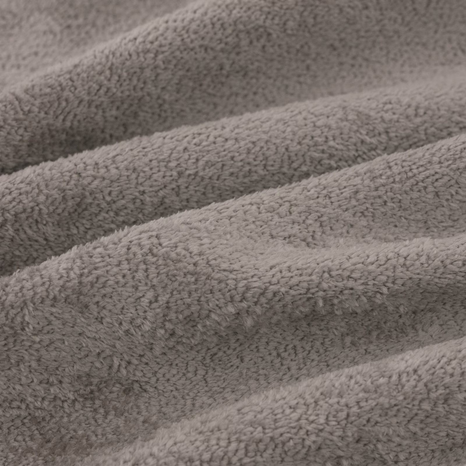 Close-up of mushroom-grey Cecconi fabric with dense plush, nubby woven texture