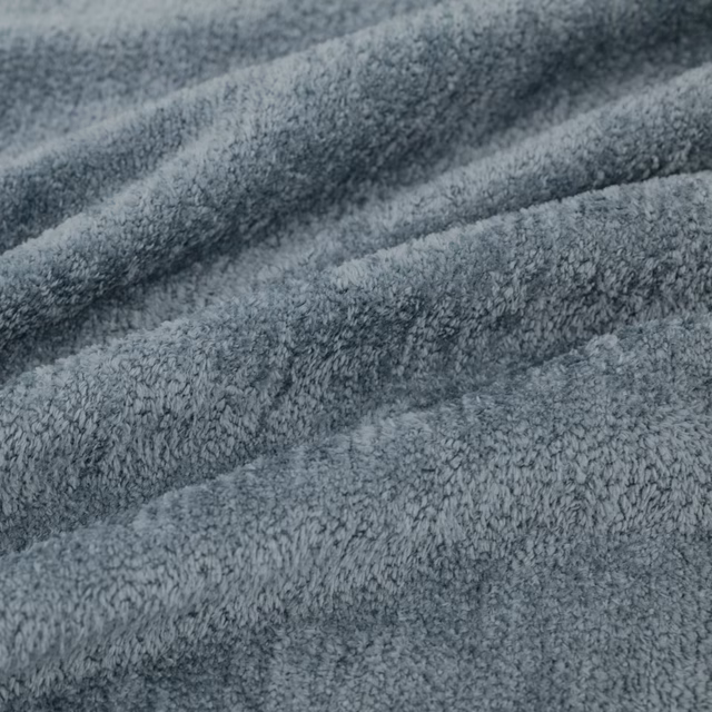Cool battleship blue-grey plush pile forming soft diagonal folds