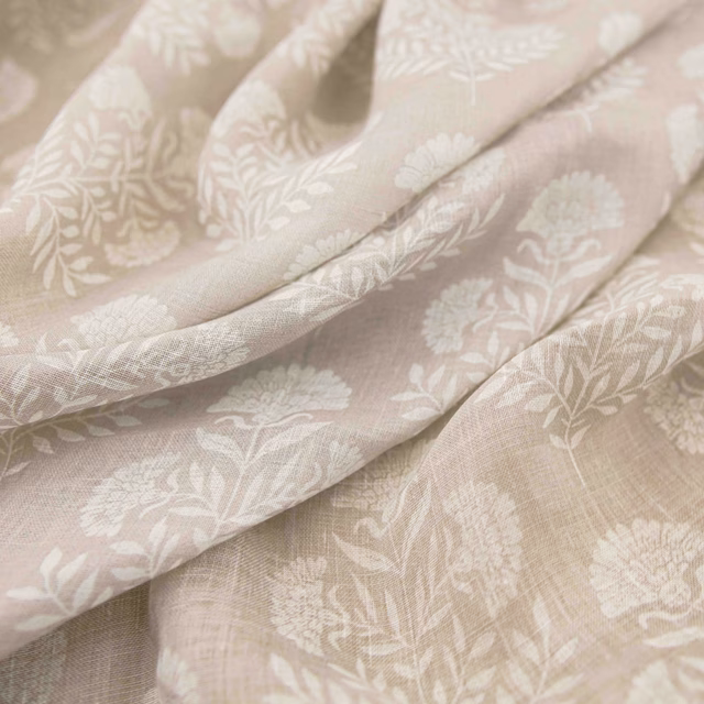 Pale blush-taupe woven fabric with white leafy stems and rounded floral blooms