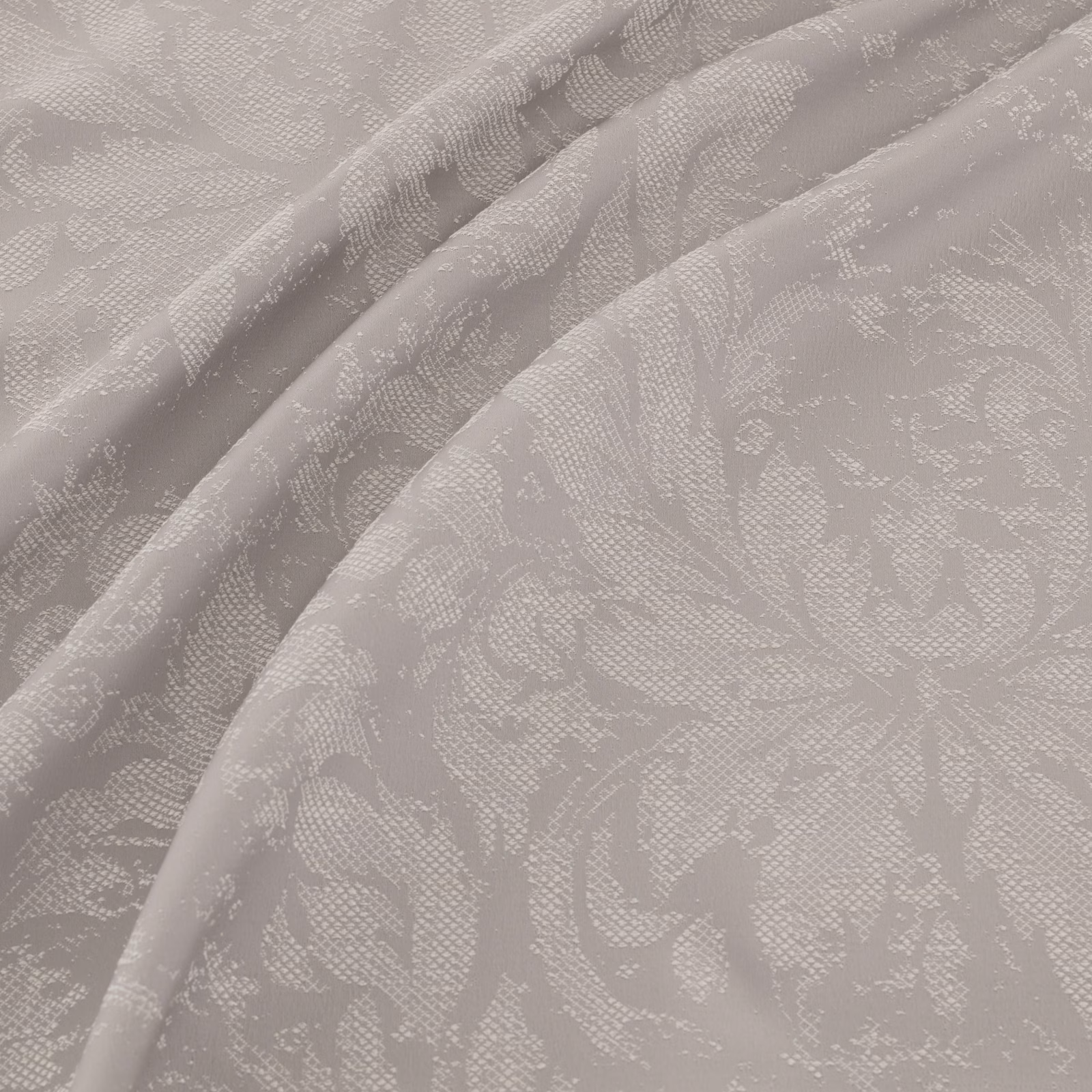 Pale steel-grey floral woven fabric with soft texture draped in overlapping folds