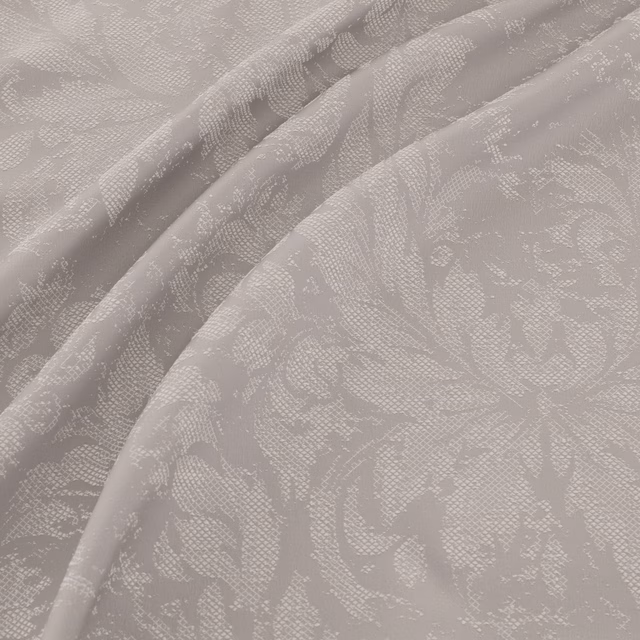 Pale steel-grey floral woven fabric with soft texture draped in overlapping folds