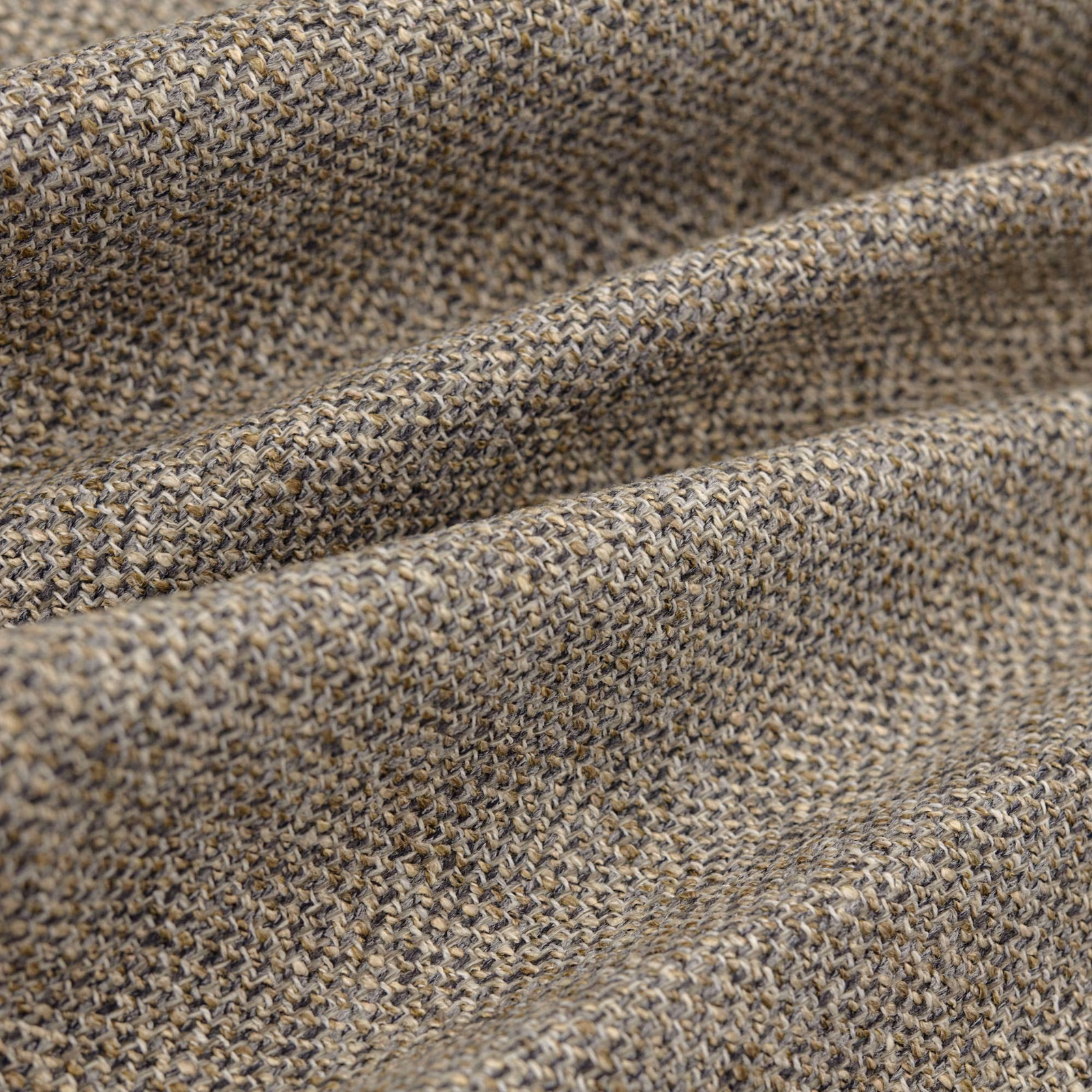 Close-up of taupe-grey Chanel Shingle showing dense braided weave and folded texture