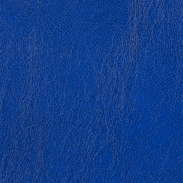 Deep lapis-blue fabric with fine pebbled grain and subtle vertical striations