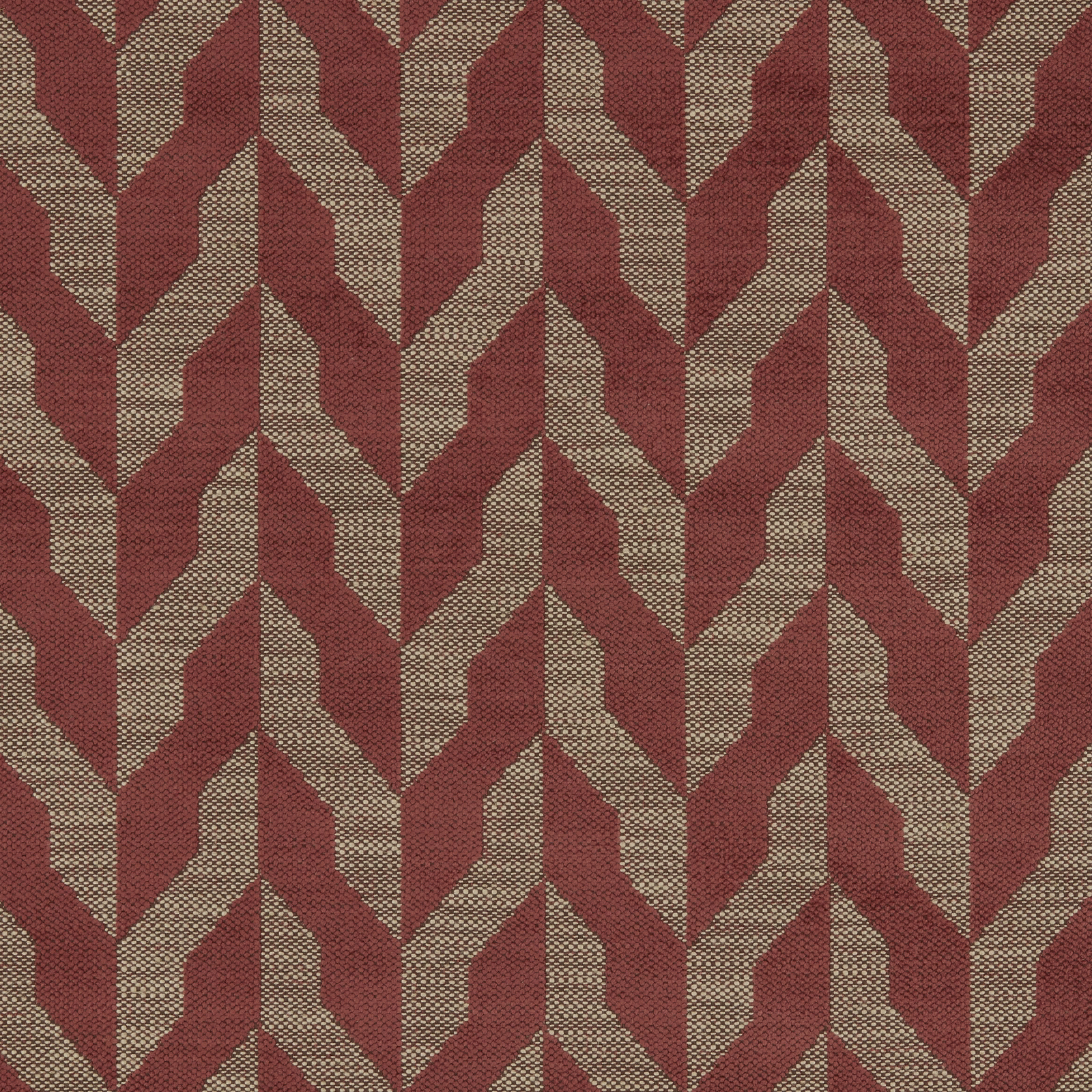 Terracotta red and beige geometric woven upholstery fabric with a repeating chevron lattice