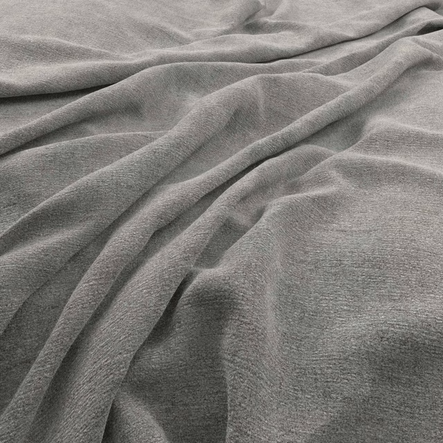 Soft mid-grey Ciaga fabric with fine woven texture arranged in fluid folds