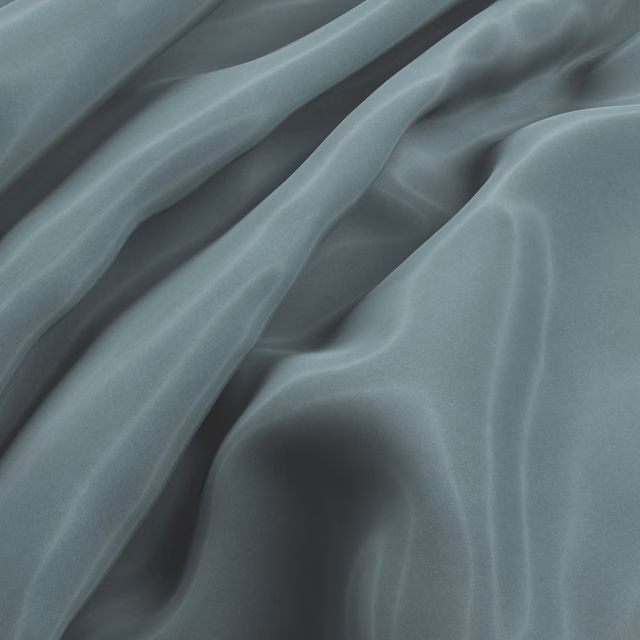 Cool blue-grey Cipriana Ocean fabric gathered into softly lustrous, fluid folds