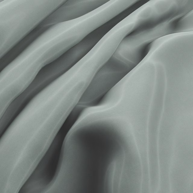 Smooth muted seaglass teal fabric falling in fluid, softly luminous folds