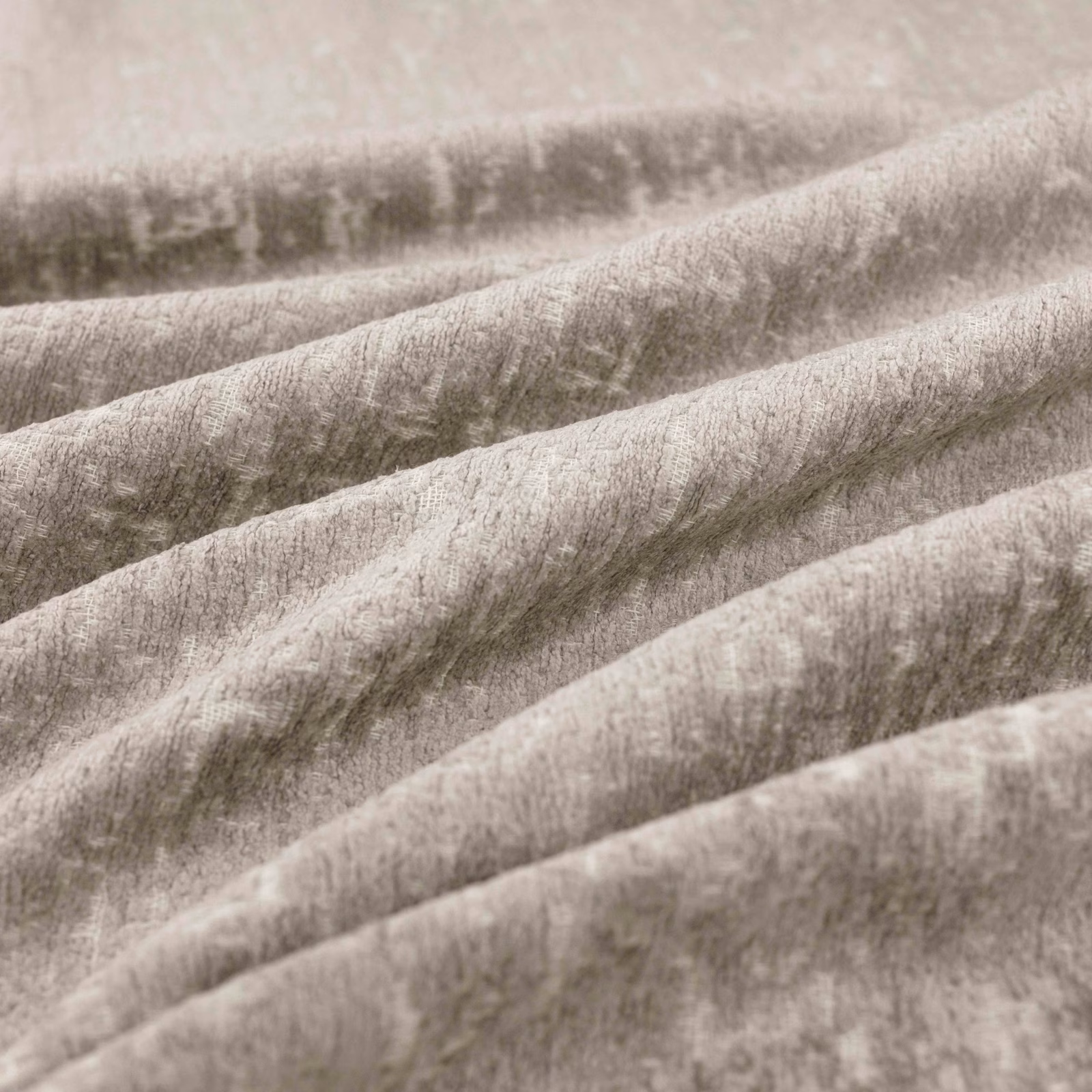 Smoky greige napped fabric with soft cloudy tonal shading in folded drapes