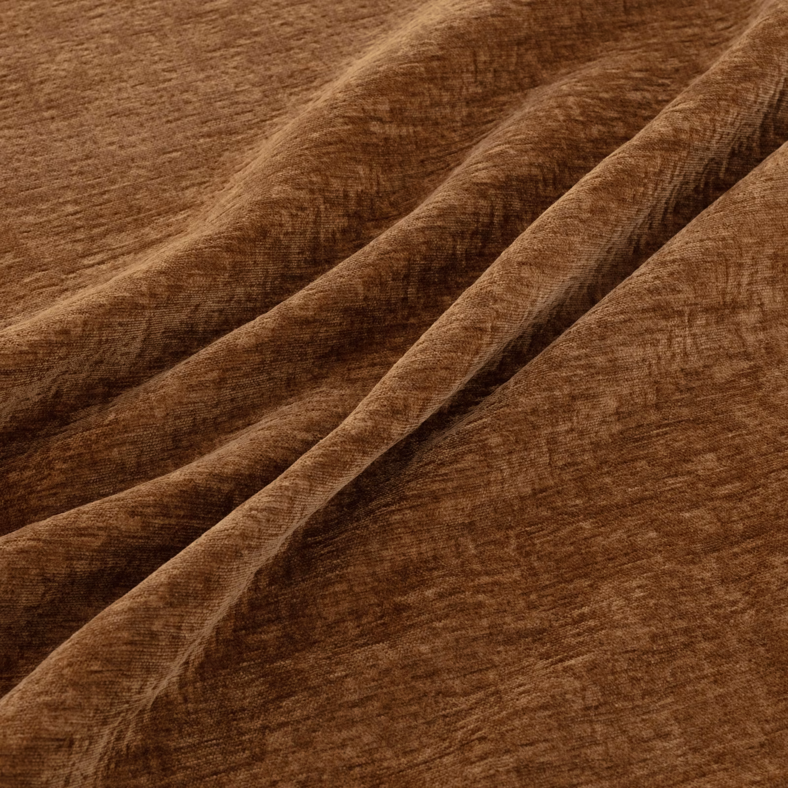 Warm kiln-brown brushed fabric showing fine tonal texture across deep folded ridges