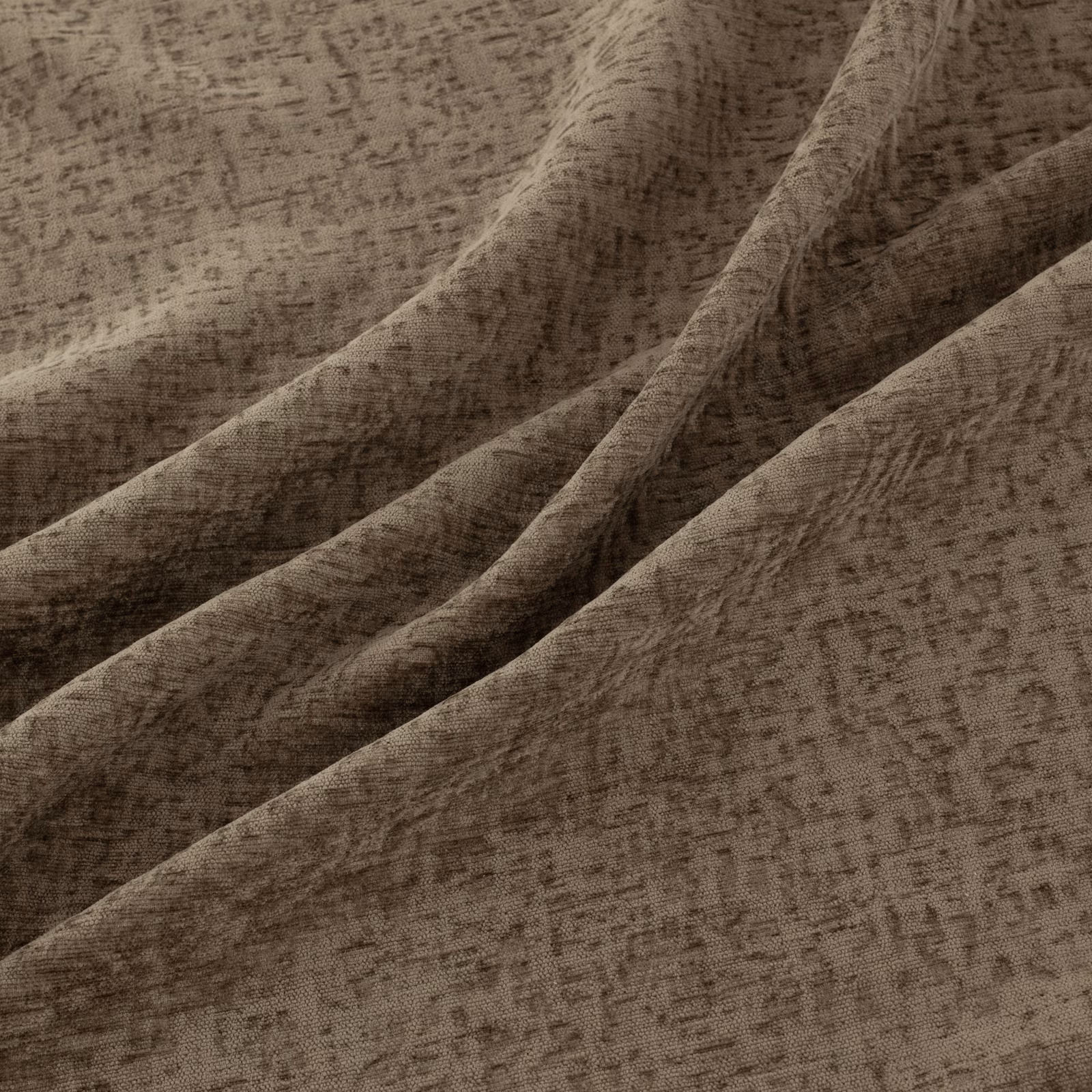 Warm taupe-brown Courchevel textile with irregular distressed marks and softly folded texture