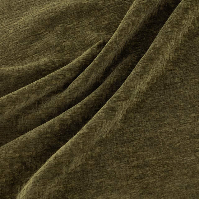 Deep moss-green plush fabric with softly brushed texture and pronounced draped folds