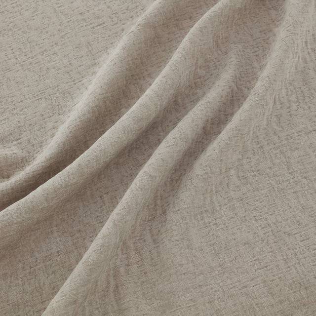 Pale oyster grey-beige fabric with fine mottled weave falling in soft folds