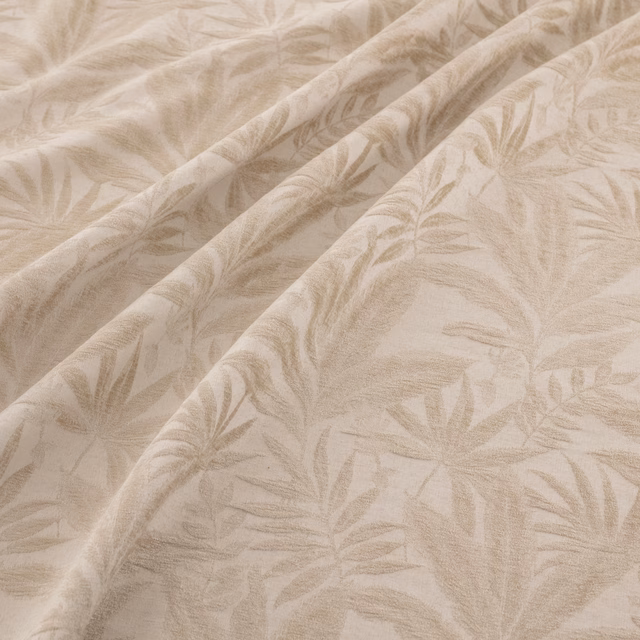 Warm platinum fabric with taupe-grey leafy botanical motifs and softly textured folds