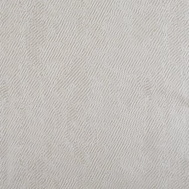 Close-up of soft ivory fabric with fine, irregular rippled woven texture