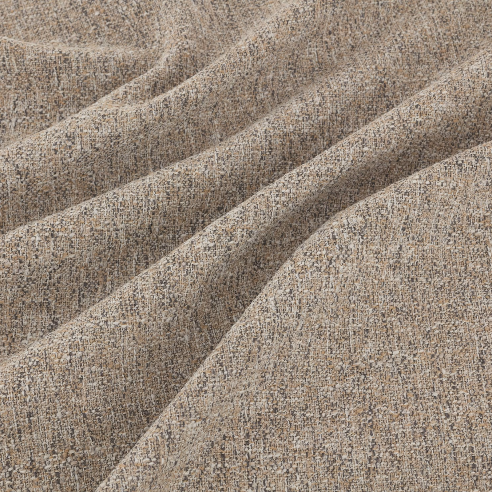 Warm biscuit beige fabric with mottled taupe weave and soft textured folds